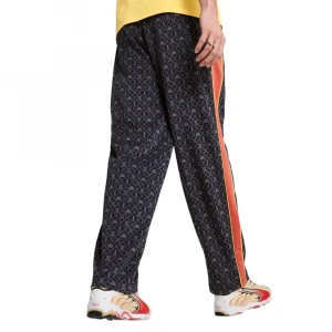 Брюки Puma Road To Unity Graphic Relaxed Track Pants Men 3