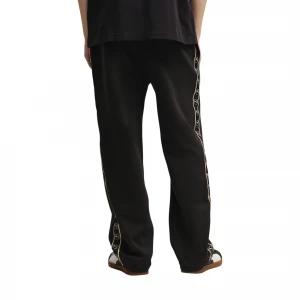 брюки ESS ELEVATED TAPE Relaxed Sweatpants FL 1
